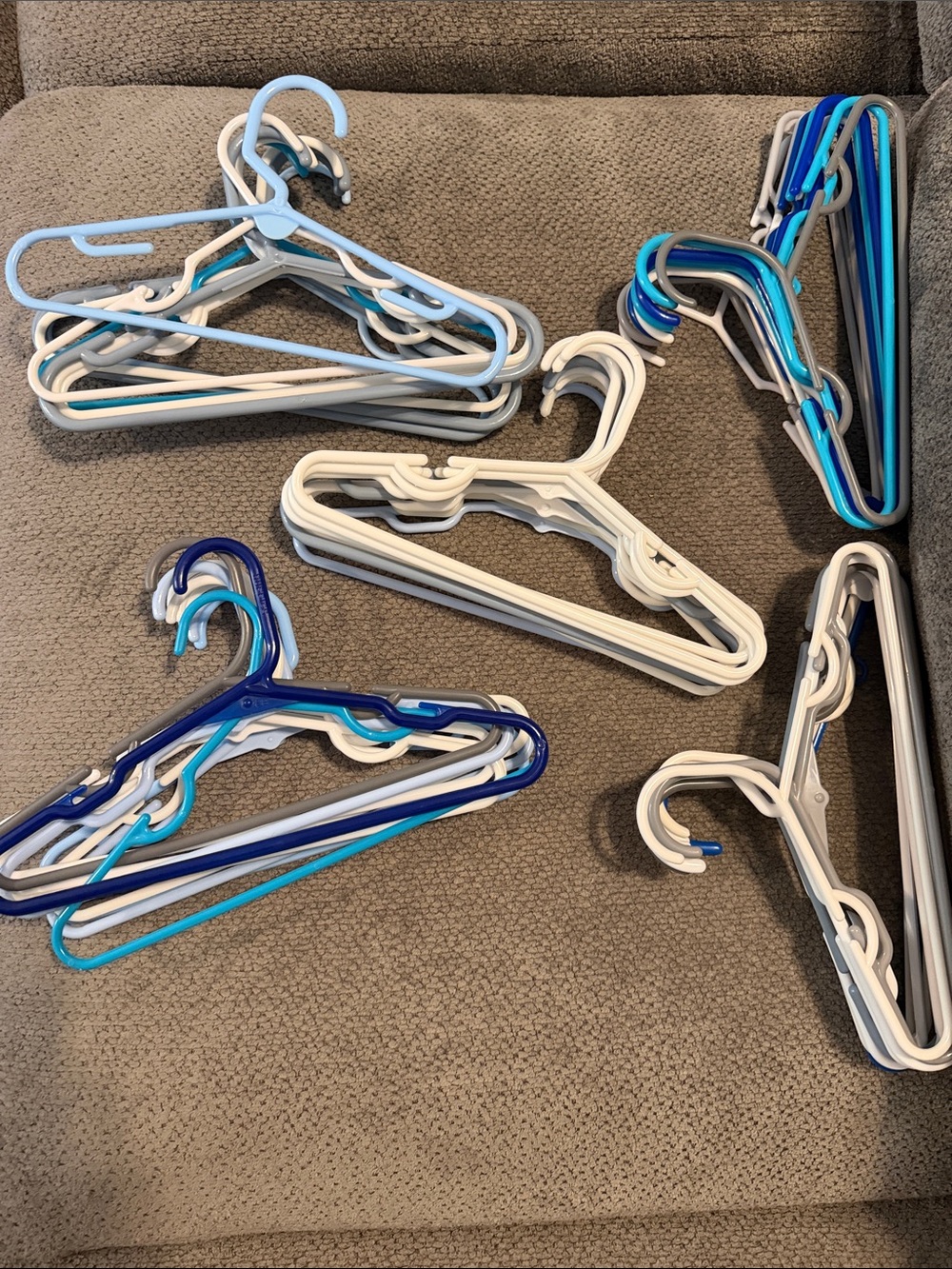 Assorted Blue and White Plastic Toddler Clothing Hangers - Multi-Pack (49)
